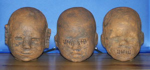 Shrink Heads by DragonEmotion