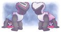 two cute padded skunkies!