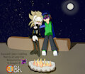 Saya and Lance Cuddling Next to a Campfire
