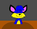 alex the fox in a mud bath