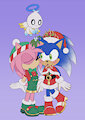 Sunbeam and Jamie under the mistletoe