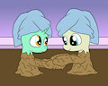 Couple mud spa by mucky