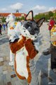 Fursuit parade pose.