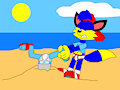 Alex the Fox pulls andrew out of sand at the beach