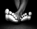 Feet in black an' white